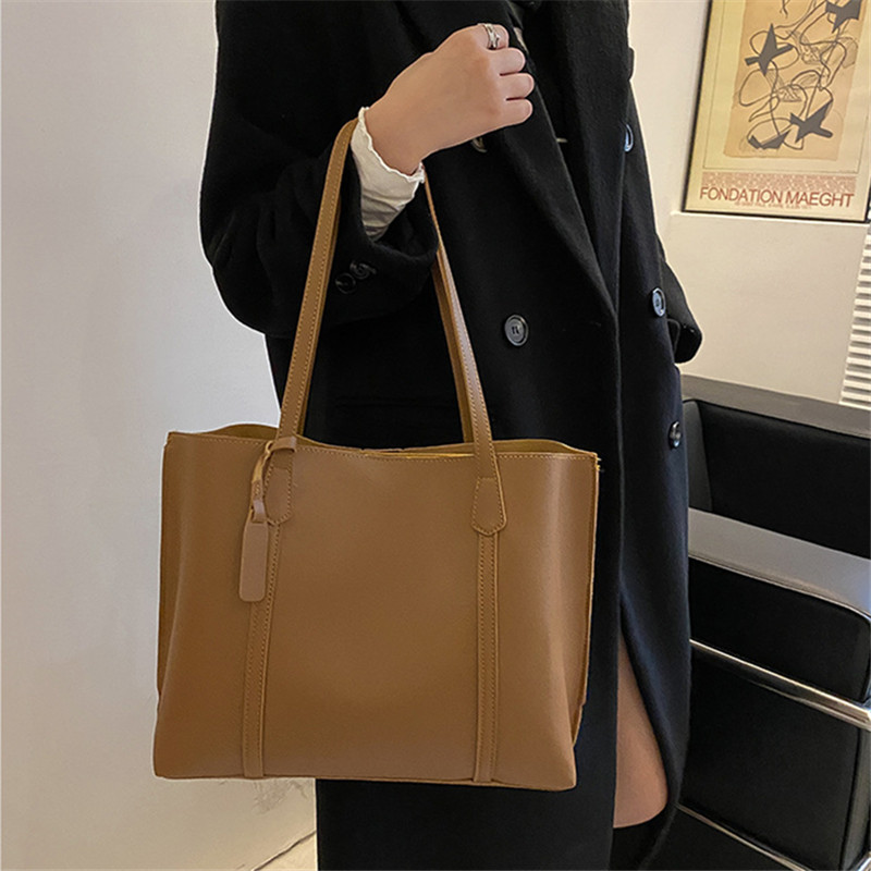Classic Black Faux Leather Tot - огляд і ціна Leather Work Bag Women